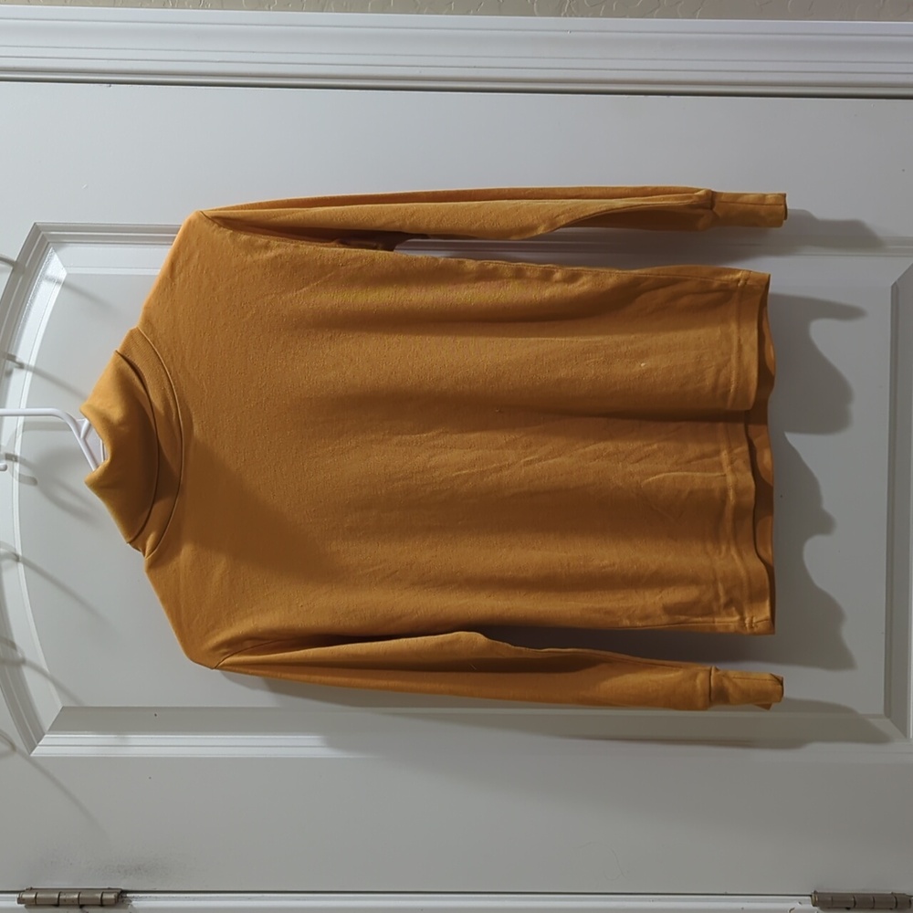 Orange turtle neck long sleeve shirt